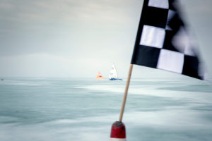 Ice sailing European championship on the Balaton / Balaton in Hungary, the orange regatta brand and the limit banner featuring the regatta track Ice sailing European championship on the Balaton / Balaton in Hungary, the orange regatta brand and the limit banner featuring the regatta track